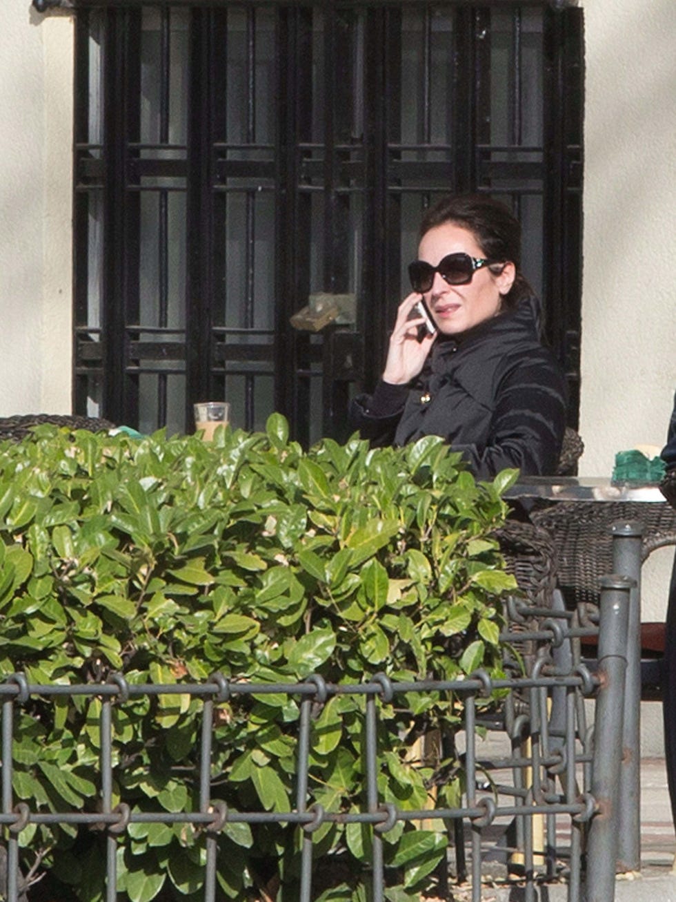 Eyewear, Sunglasses, Goggles, Outerwear, Jacket, Street fashion, Iron, Plant stem, Fence, Herb, 