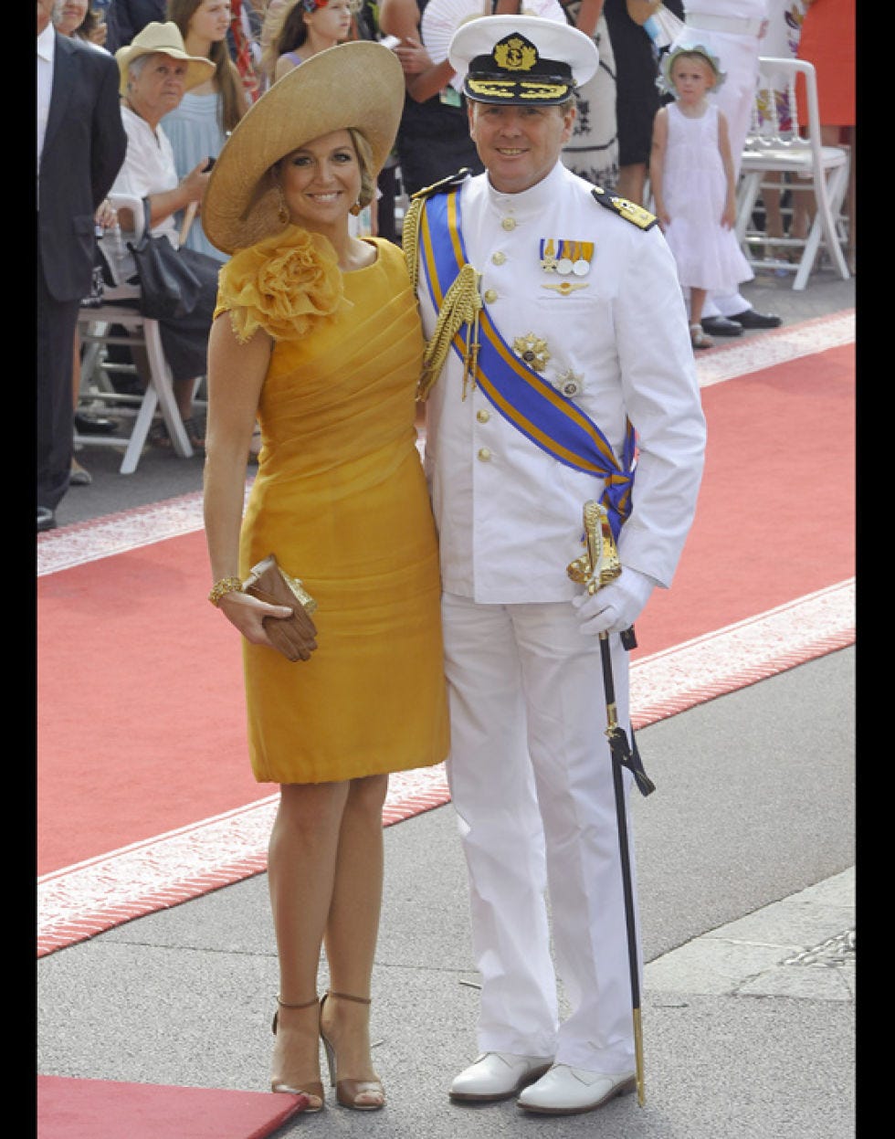 Footwear, Hat, Dress, Fashion accessory, Sun hat, Sunglasses, Naval officer, Blond, Necklace, Goggles, 