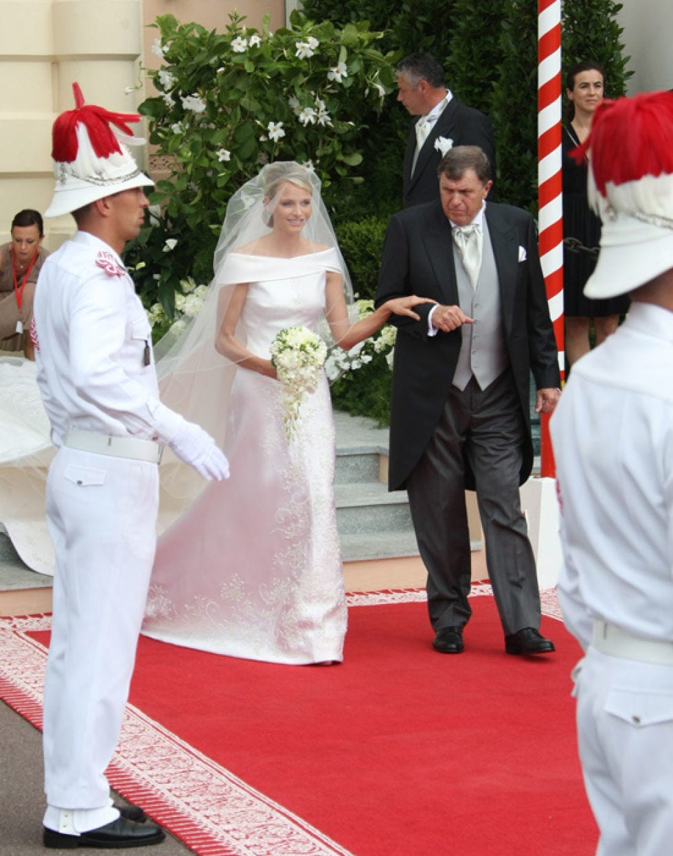 Clothing, Coat, Event, Dress, Trousers, Flooring, Hat, Suit, Photograph, Bridal clothing, 