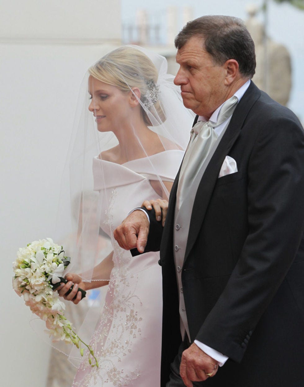 Clothing, Coat, Trousers, Dress, Bridal clothing, Bridal veil, Petal, Photograph, Suit, Outerwear, 