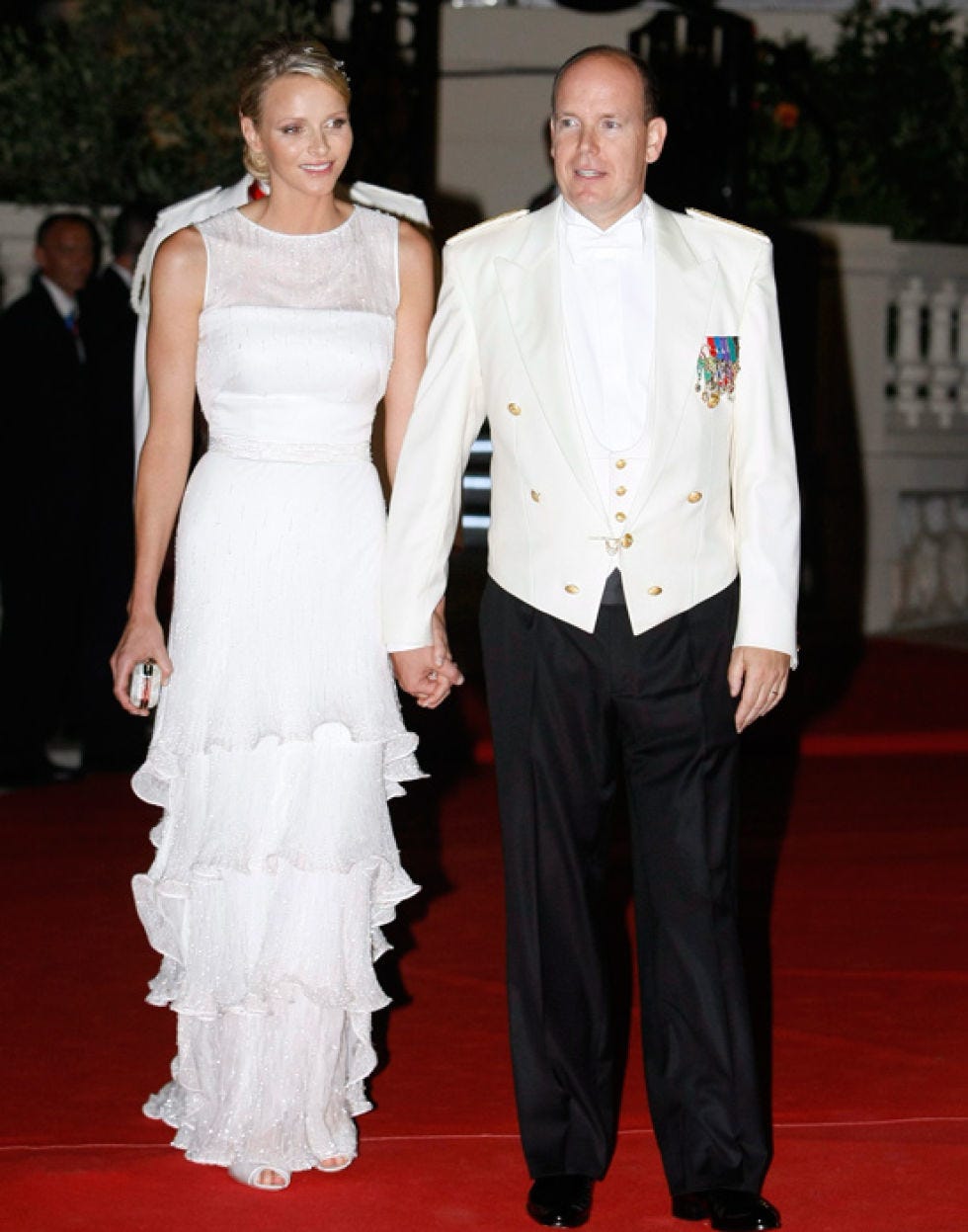 Clothing, Coat, Dress, Trousers, Event, Shirt, Flooring, Suit, Outerwear, Formal wear, 