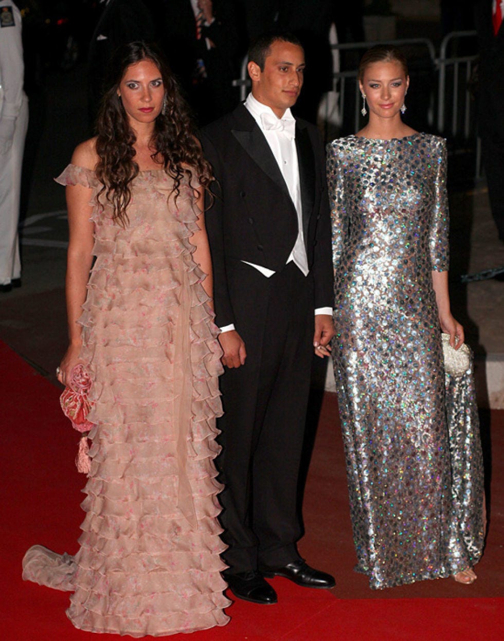 Clothing, Coat, Dress, Event, Trousers, Flooring, Outerwear, Red, Suit, Formal wear, 