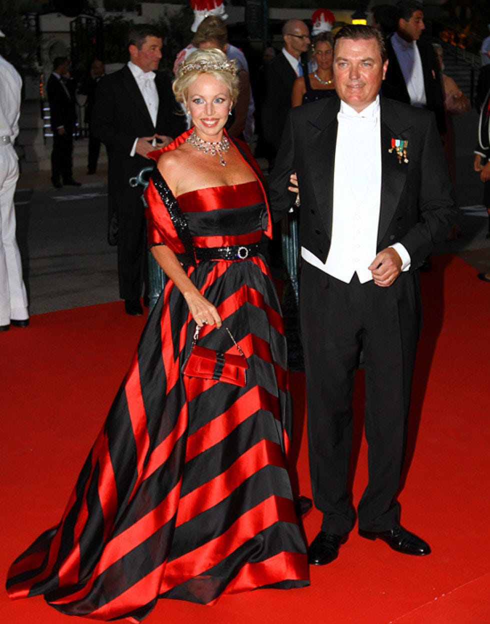 Clothing, Coat, Flooring, Event, Trousers, Red, Carpet, Suit, Shirt, Dress, 
