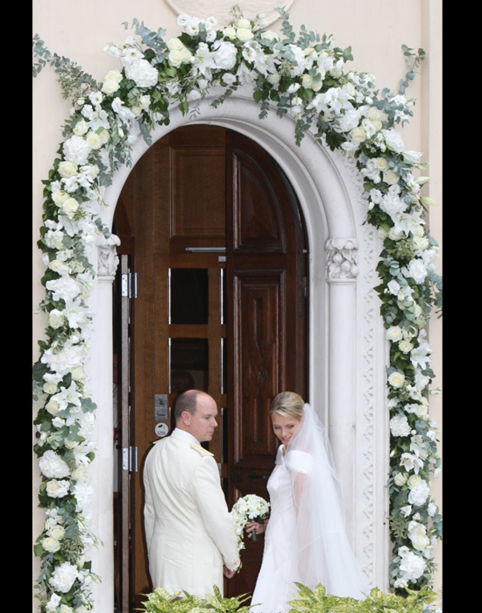Dress, Bridal clothing, Bridal veil, Door, Wedding dress, Bride, Petal, Marriage, Ceremony, Gown, 