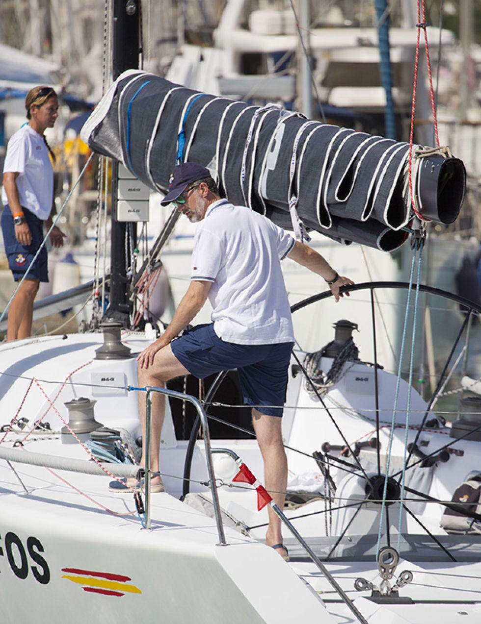 Watercraft, Naval architecture, Boat, Ship, Sailboat, Back, Bermuda shorts, Crew, Mast, Trunks, 