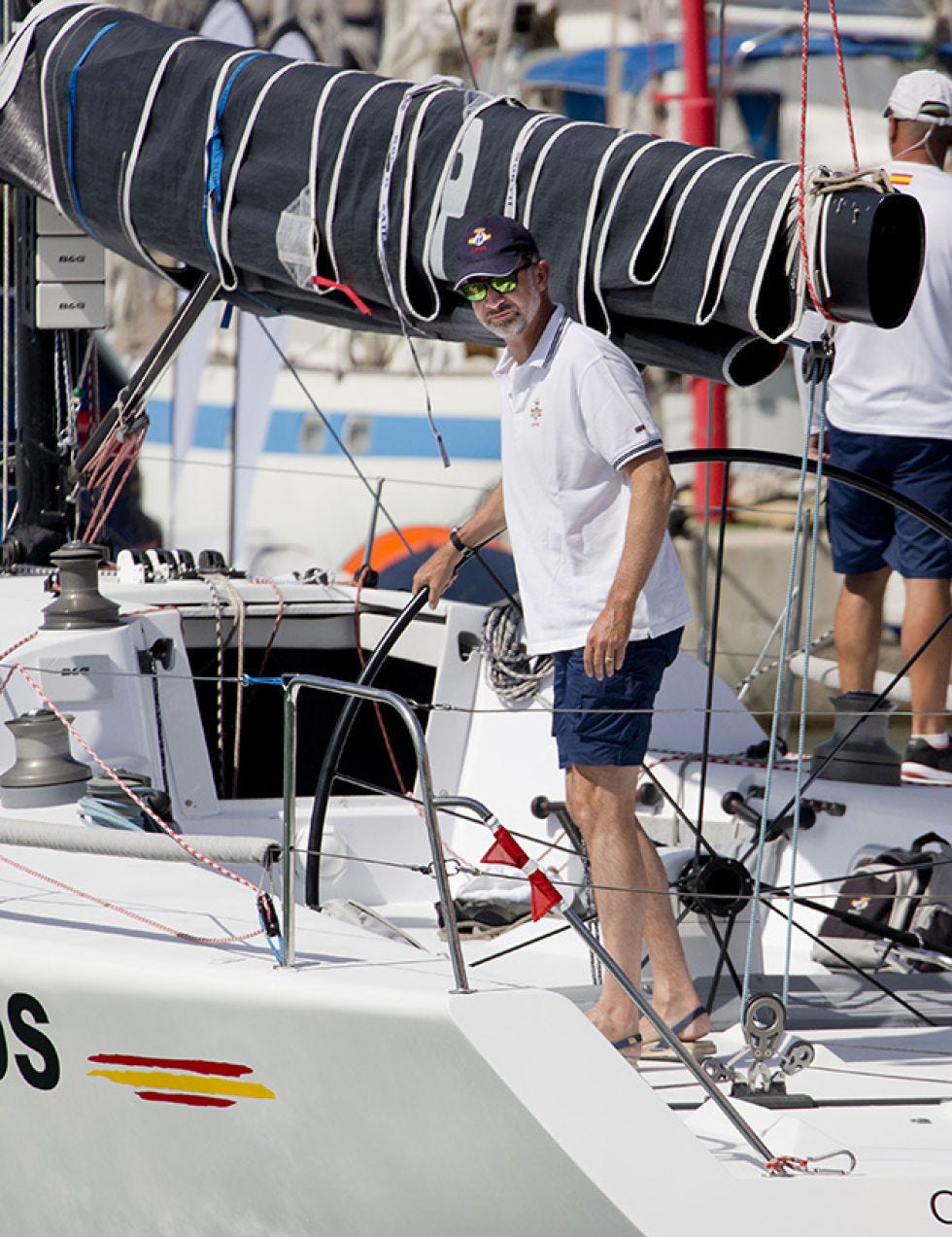 Watercraft, Shorts, Boat, Naval architecture, Camera, Bermuda shorts, Ship, board short, Trunks, Speedboat, 