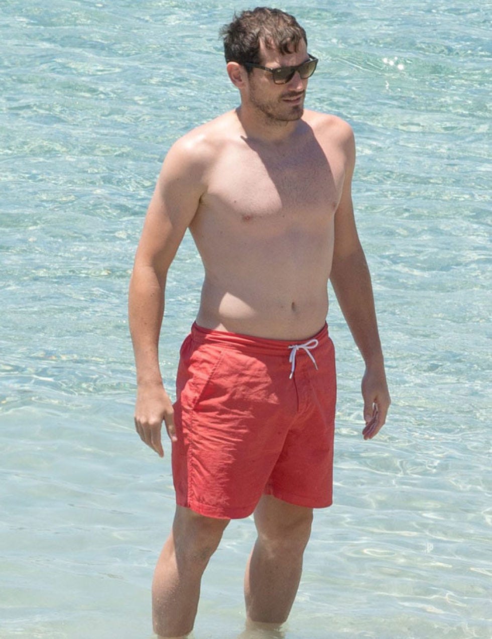 Clothing, Human body, board short, Goggles, Standing, Chest, Summer, Active shorts, Barechested, Shorts, 