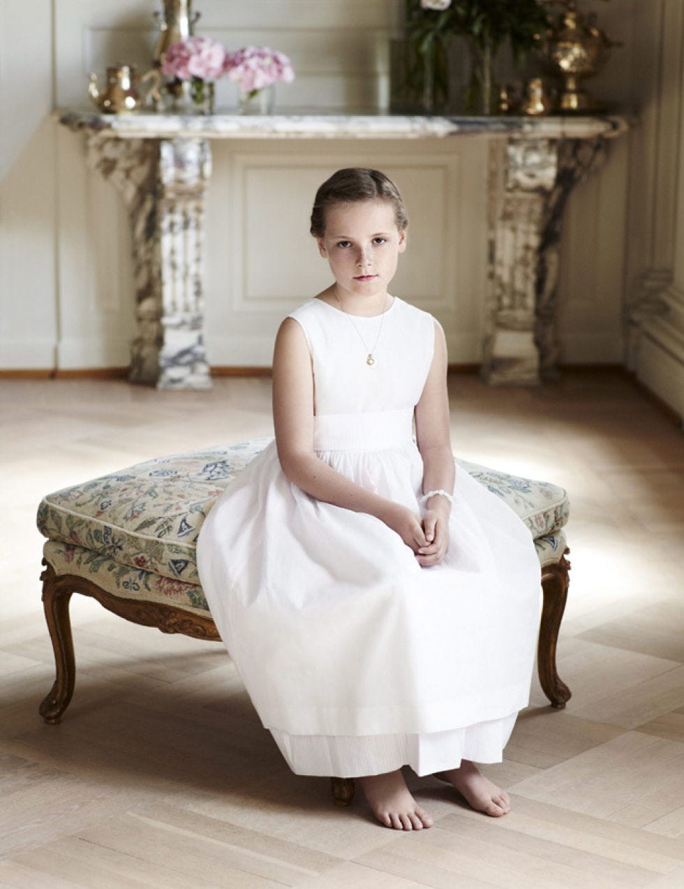 Clothing, Floor, Flooring, Dress, Shoulder, Room, Photograph, Sitting, White, Formal wear, 
