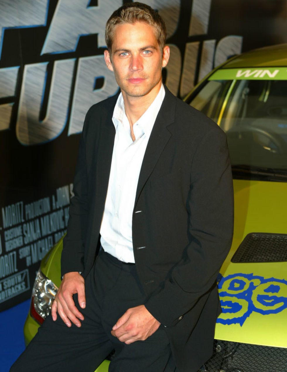 Suit, Formal wear, Blazer, Tuxedo, Outerwear, White-collar worker, Premiere, Vehicle, Car, Family car, 