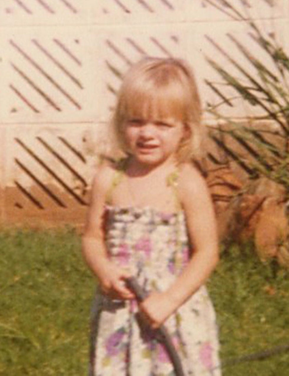 Dress, Facial expression, Child, Baby & toddler clothing, Pattern, Day dress, Toddler, Blond, One-piece garment, Child model, 