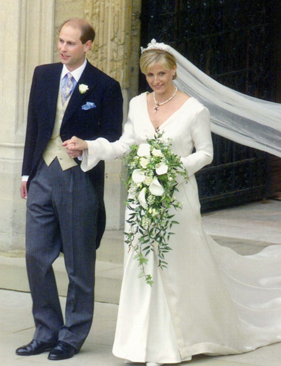Clothing, Coat, Bridal clothing, Trousers, Dress, Shirt, Bouquet, Textile, Petal, Photograph, 