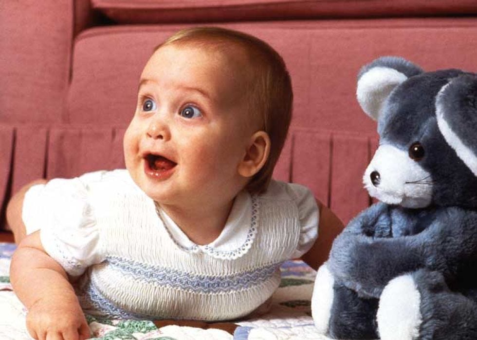 Nose, Cheek, Skin, Stuffed toy, Toy, Baby & toddler clothing, Tummy time, Terrestrial animal, Comfort, Baby, 