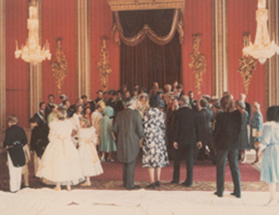 Dress, Formal wear, Suit, Curtain, Vintage clothing, Ceremony, Hall, Function hall, Gown, One-piece garment, 