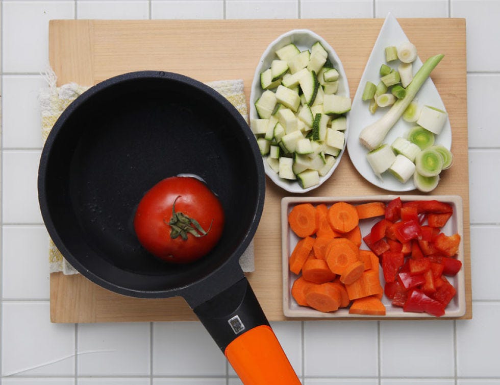 Food, Vegetable, Produce, Ingredient, Cookware and bakeware, Dishware, Orange, Vegan nutrition, Food group, Frying pan, 