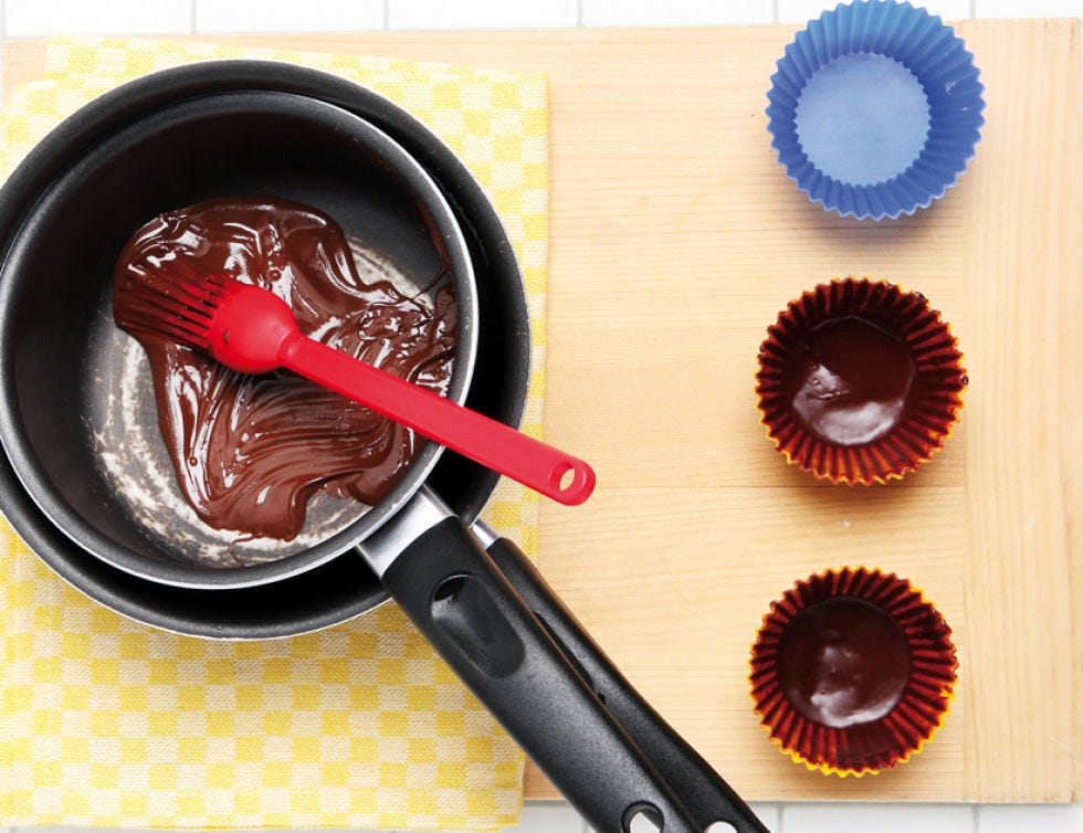Food, Ingredient, Kitchen utensil, Baking cup, Chocolate, Spoon, Whisk, Sweetness, Cutlery, Confectionery, 