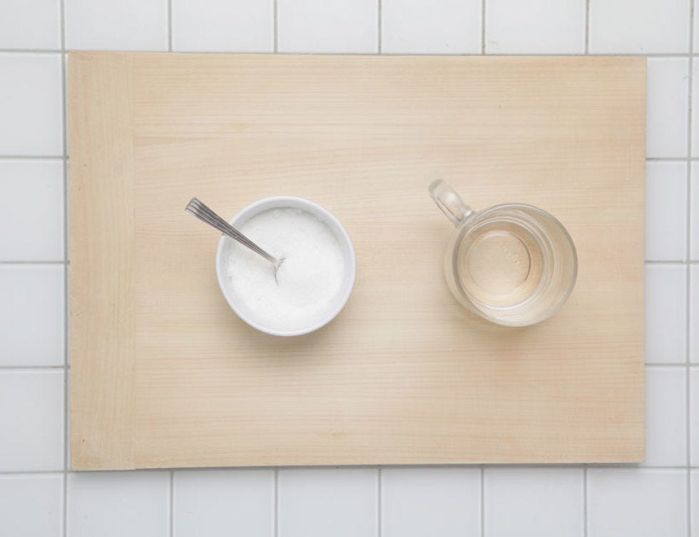 Wood, Wall, Circle, Dishware, Tile, Plate, Plywood, Kitchen utensil, Adhesive tape, Household hardware, 