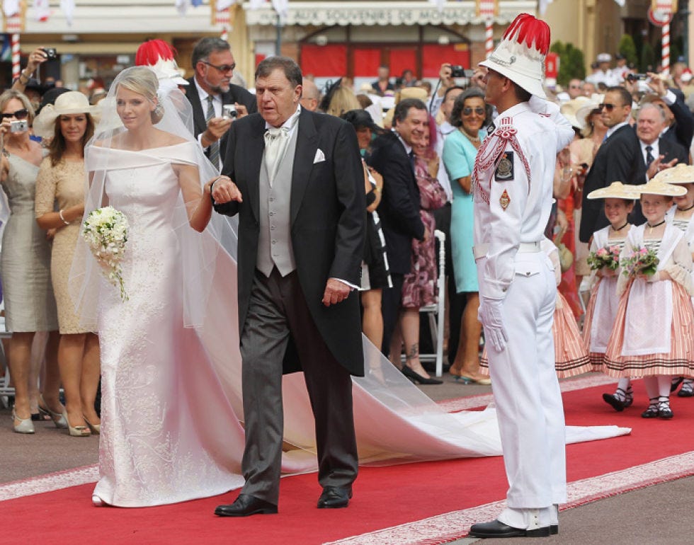 Footwear, Hat, Event, Trousers, Coat, Dress, Flooring, Shirt, Outerwear, Suit, 