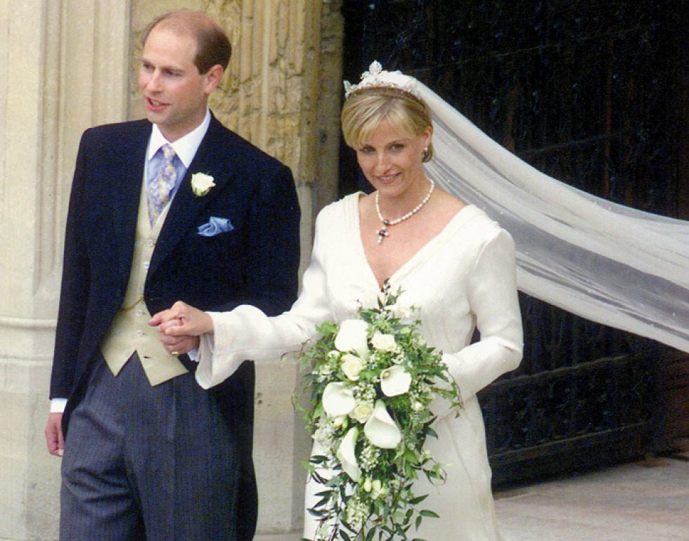 Clothing, Coat, Trousers, Bridal clothing, Petal, Photograph, Suit, Outerwear, Dress, Formal wear, 