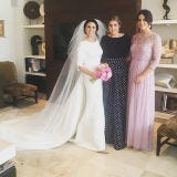 Clothing, Human body, Property, Bridal clothing, Textile, Room, Photograph, Shelf, White, Dress, 