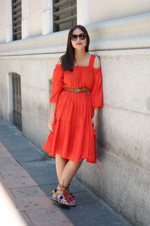 Clothing, Sleeve, Shoulder, Human leg, Joint, Red, Dress, Sunglasses, Style, Street fashion, 