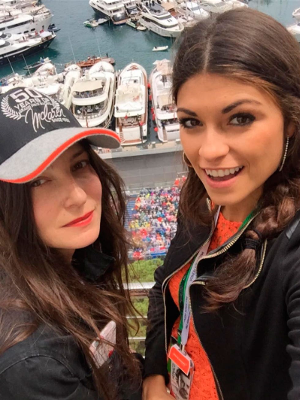Lip, Cap, Fashion accessory, Youth, Street fashion, Long hair, Jacket, Stole, Watercraft, Feathered hair, 
