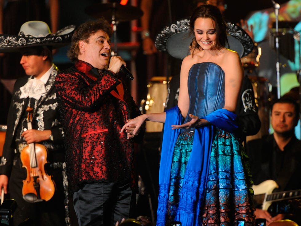 Event, Music, Musician, Entertainment, Hat, Music artist, String instrument accessory, Performing arts, Dress, Performance, 