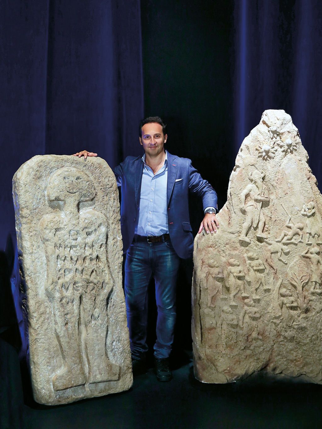 Jeans, Denim, Rock, Artifact, Jacket, Art, World, Carving, Sculpture, Ancient history, 