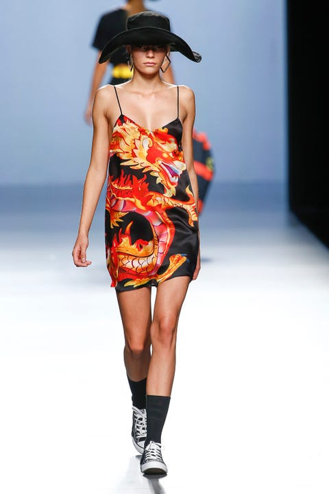 Clothing, Shoulder, Human leg, Dress, Fashion show, Joint, Fashion model, One-piece garment, Hat, Waist, 