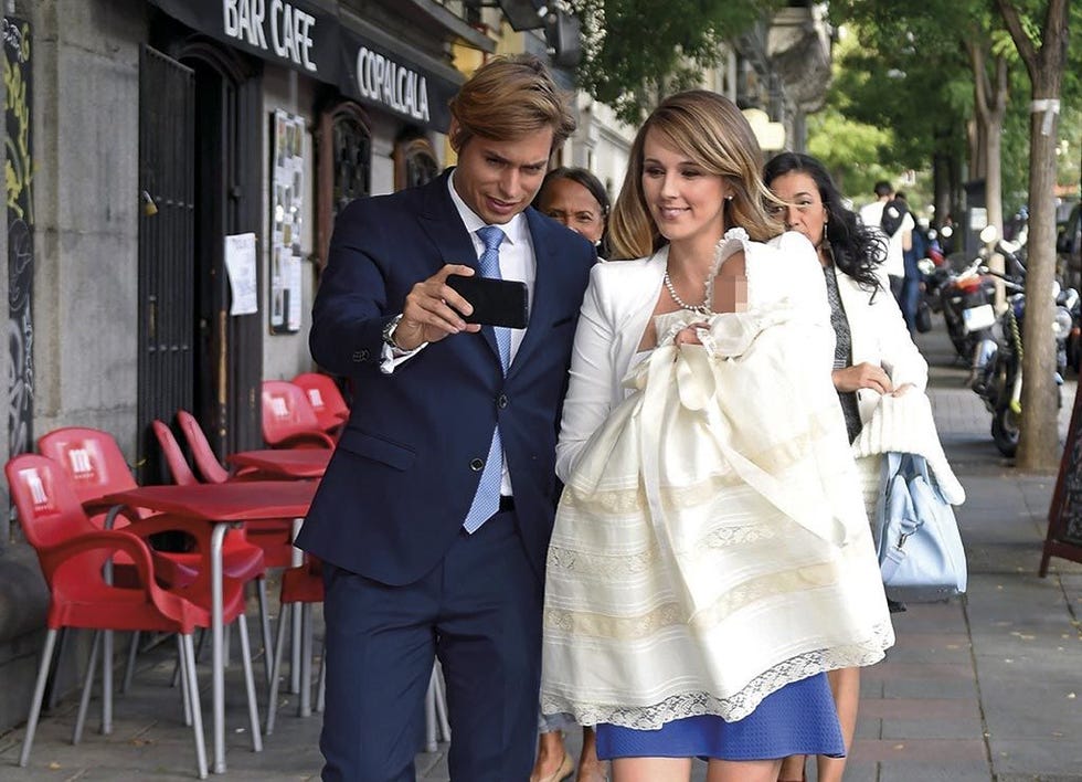 Clothing, Coat, Trousers, Outerwear, Suit, Dress, Formal wear, Bag, Street fashion, Chair, 
