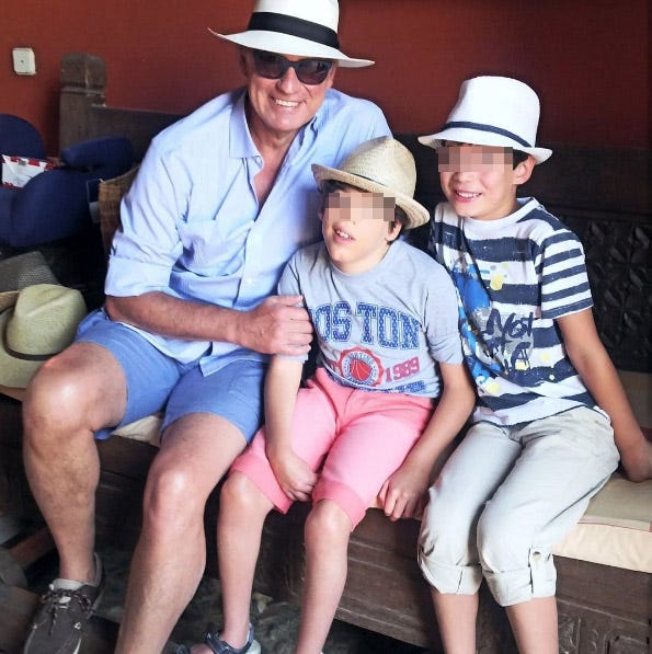 Clothing, Leg, Hat, Fun, Shoe, Shirt, Human leg, T-shirt, Facial expression, Sun hat, 