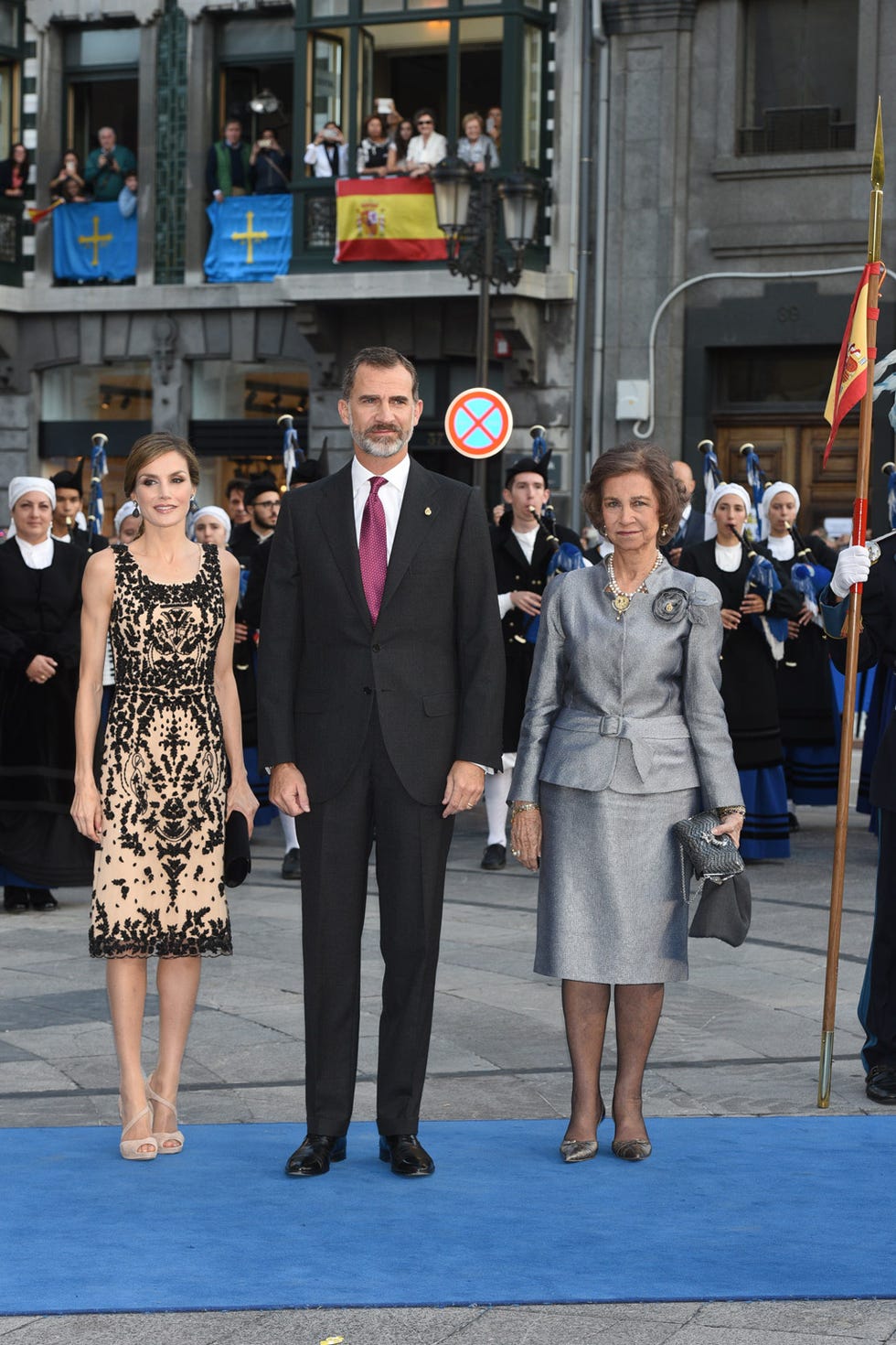 Clothing, Coat, Trousers, Shirt, Dress, Standing, Outerwear, Suit, Flag, Style, 