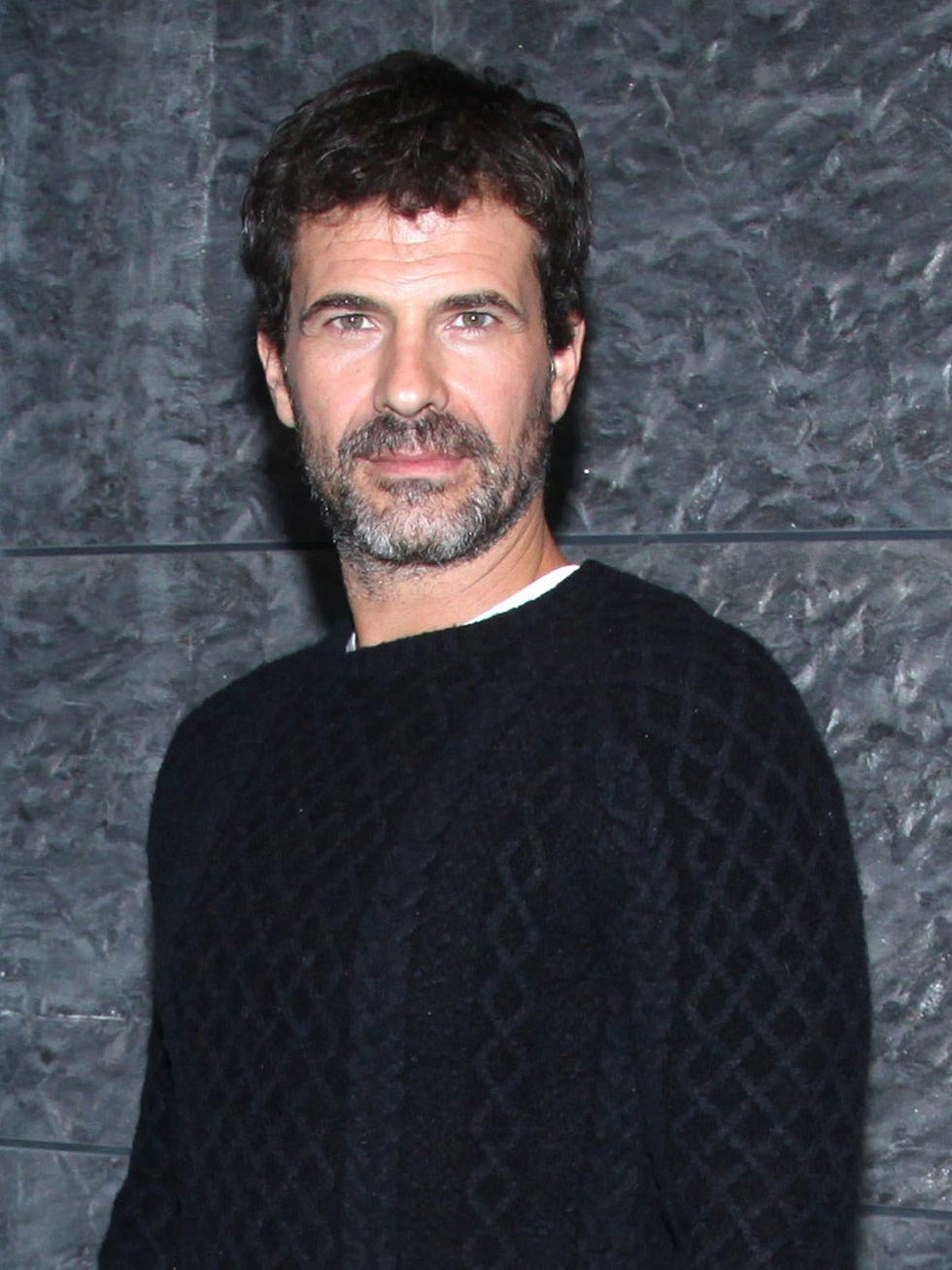 Hairstyle, Facial hair, Chin, Forehead, Eyebrow, Beard, Sweater, Moustache, Jaw, Organ, 