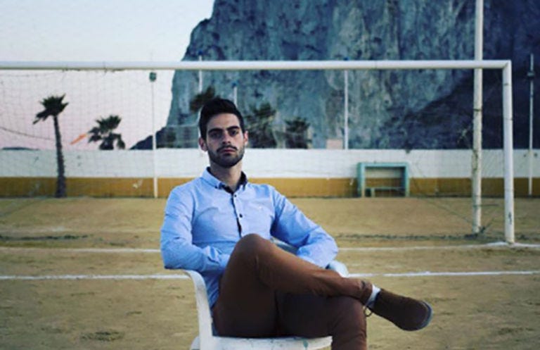 Collar, Sitting, Knee, Beard, Facial hair, Boot, Sock, Bench, 