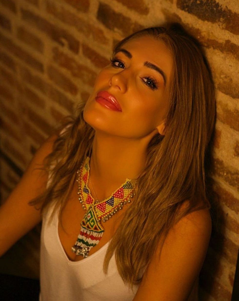 Lip, Hairstyle, Eyebrow, Amber, Eyelash, Beauty, Neck, Orange, Tan, Long hair, 
