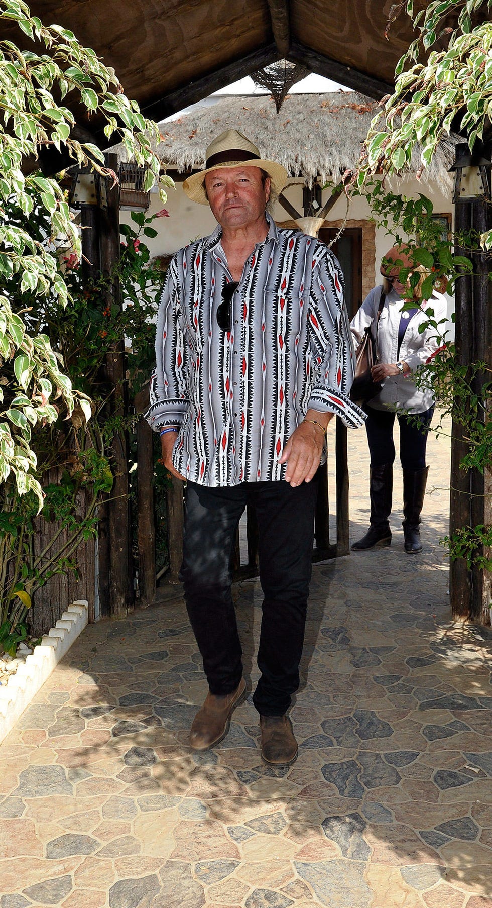 Clothing, Leg, Dress shirt, Hat, Collar, Sleeve, Trousers, Shirt, Textile, Standing, 