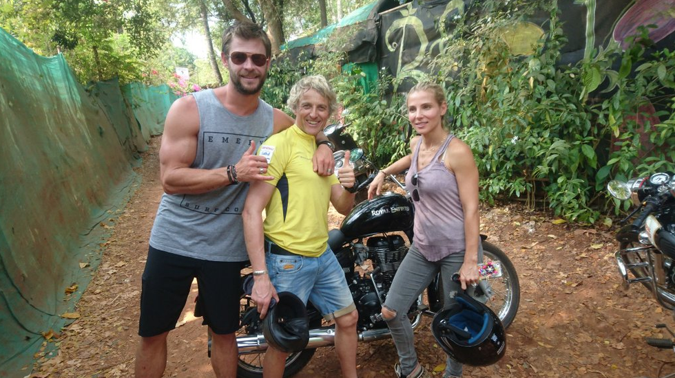Nose, Smile, Automotive tire, Vacation, Sunglasses, Chest, Bermuda shorts, Trunks, Motorcycle, 