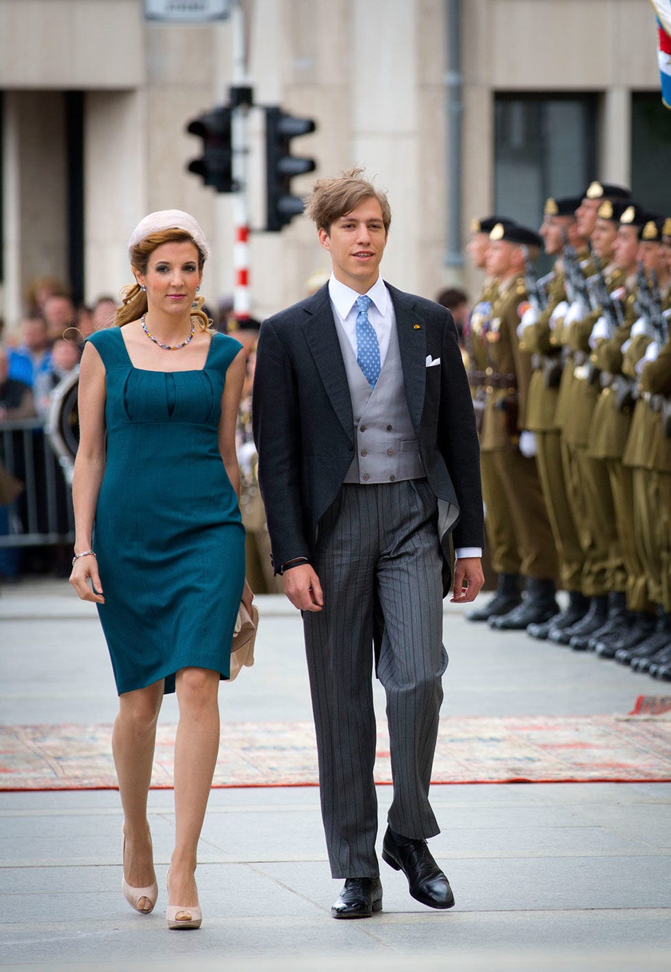 Trousers, Coat, Flag, Shirt, Standing, Outerwear, Dress, Suit, Formal wear, Style, 