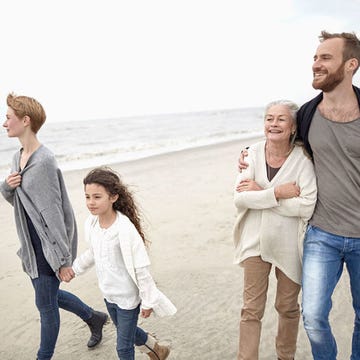 People, People on beach, Denim, Trousers, Jeans, Coastal and oceanic landforms, Shirt, Standing, Tourism, Leisure, 
