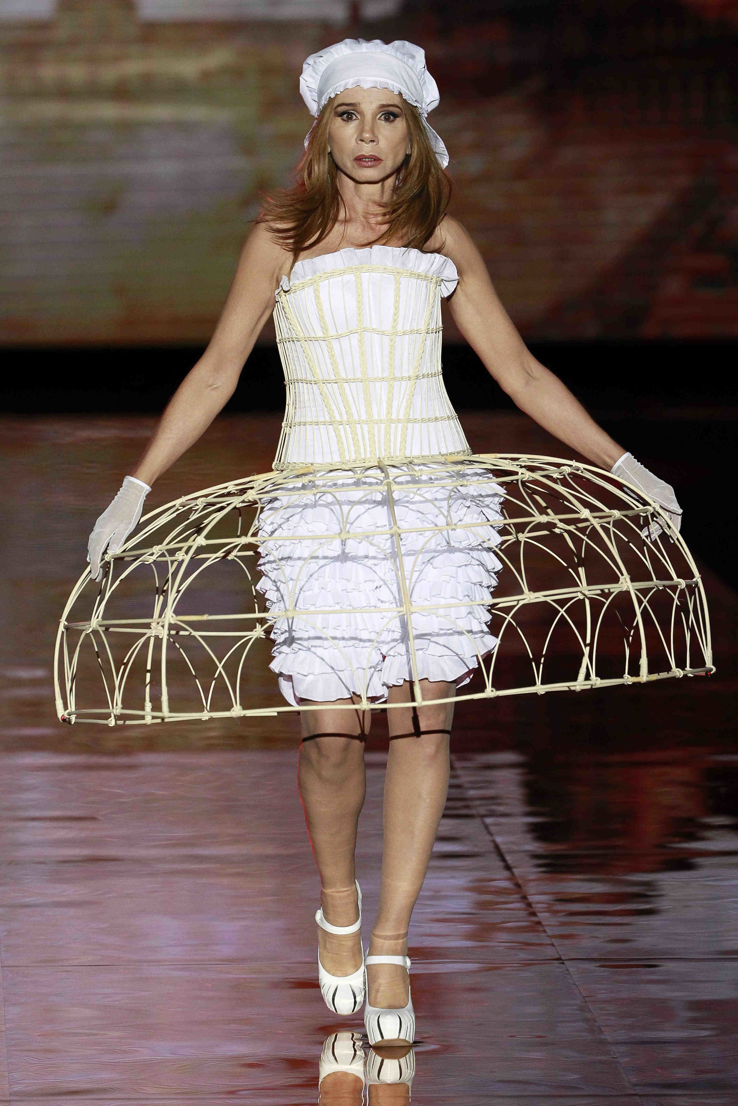 Clothing, Dress, Skin, Shoulder, Fashion model, One-piece garment, Fashion show, Costume design, Beauty, Day dress, 