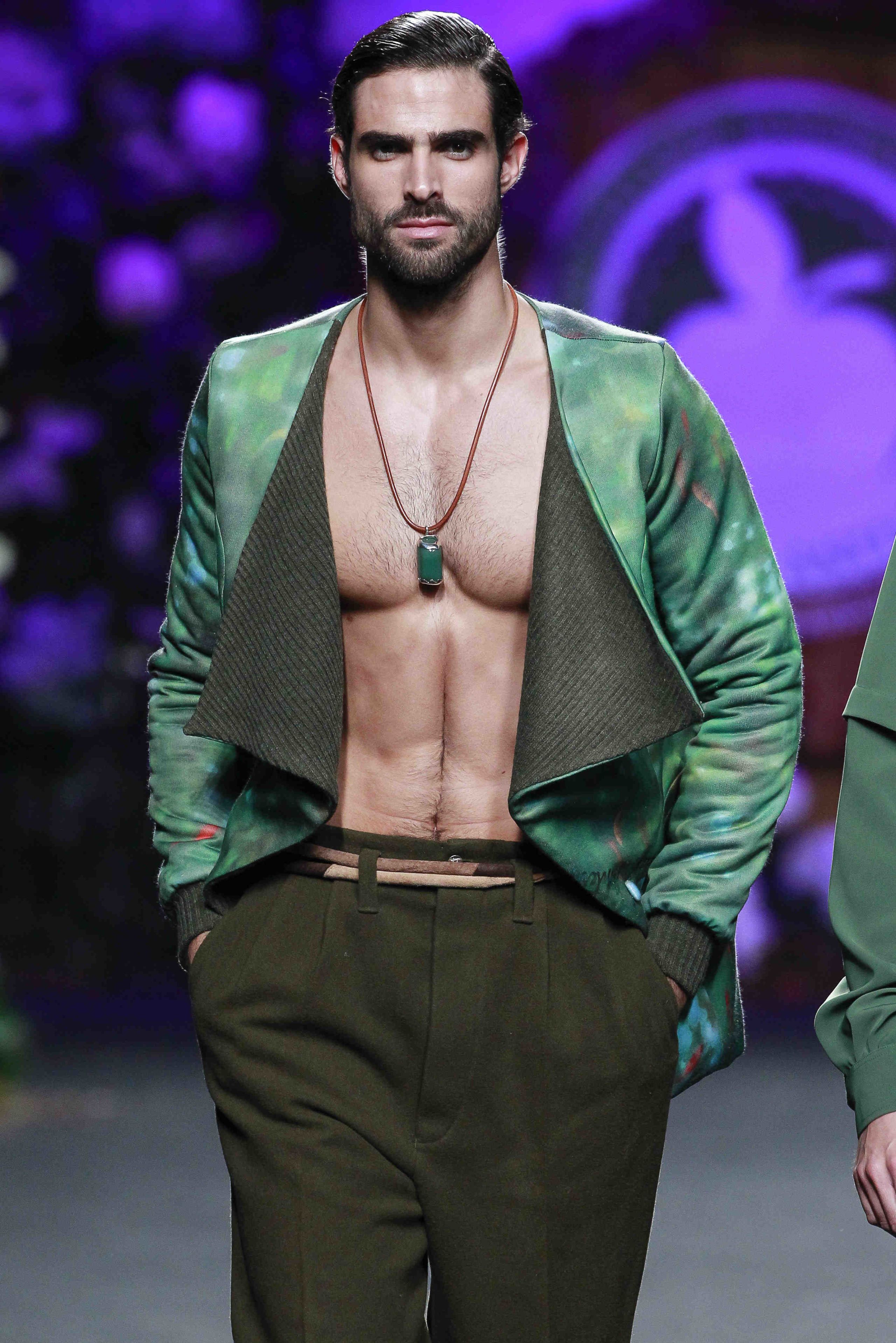 Green, Shoulder, Joint, Jewellery, Style, Chest, Fashion model, Trunk, Facial hair, Jacket, 