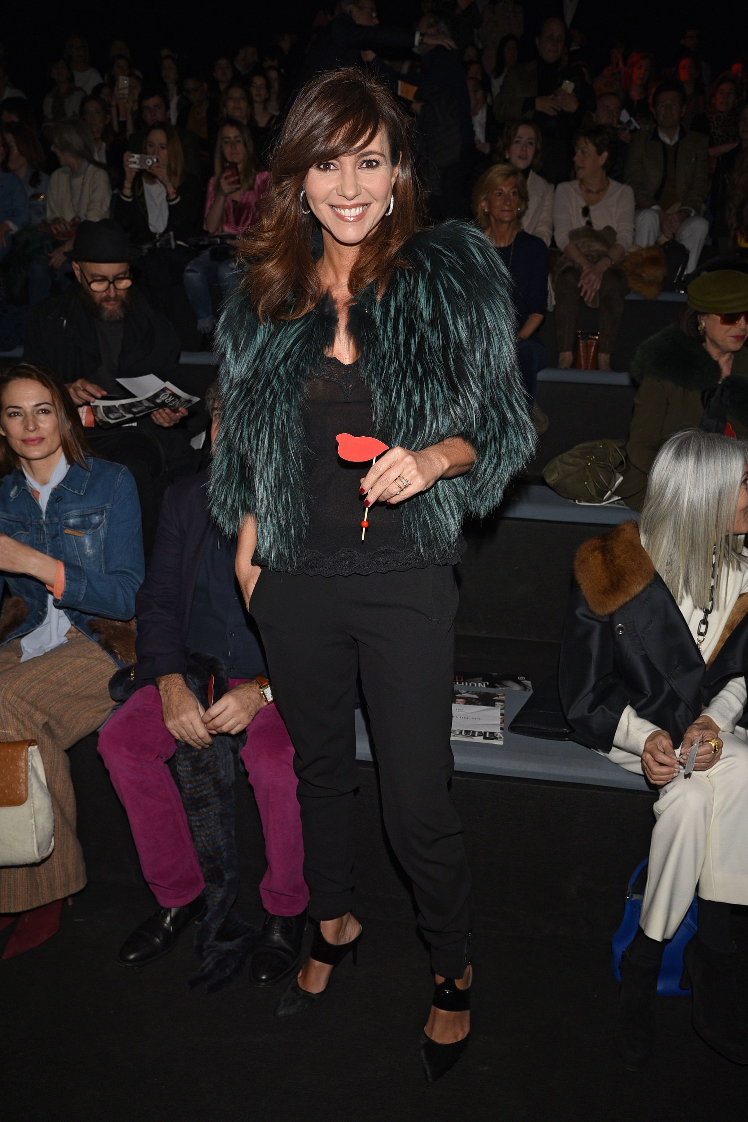 Clothing, Face, Leg, Trousers, Event, Human body, Outerwear, Coat, Style, Fashion accessory, 