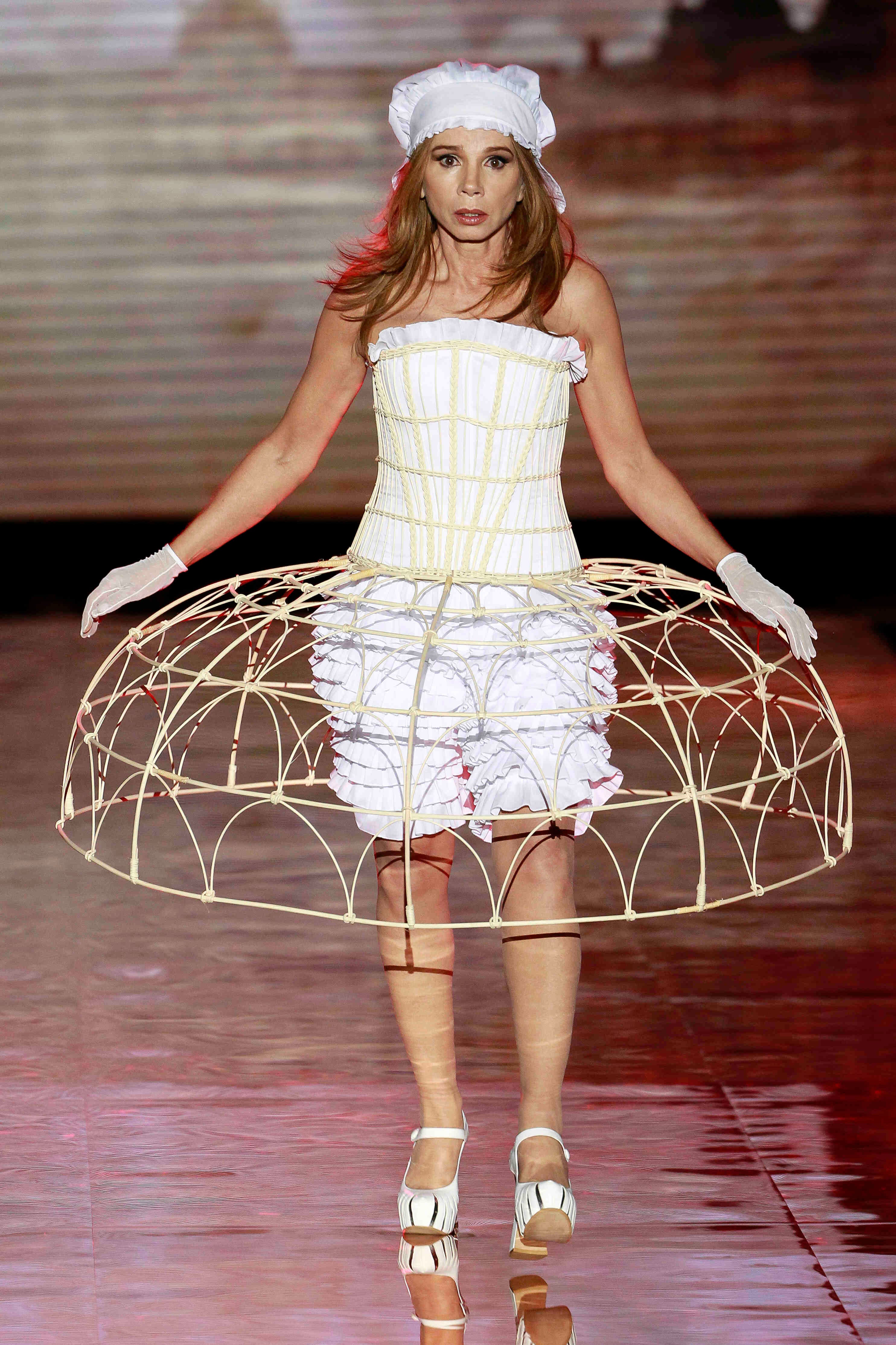Clothing, Dress, Costume design, Fashion model, Headgear, Fashion, Beauty, Embellishment, Model, One-piece garment, 