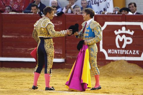 Matador, Bullfighting, Sport venue, Bullring, Animal sports, Public event, Tradition, Performance, Event, Bull, 