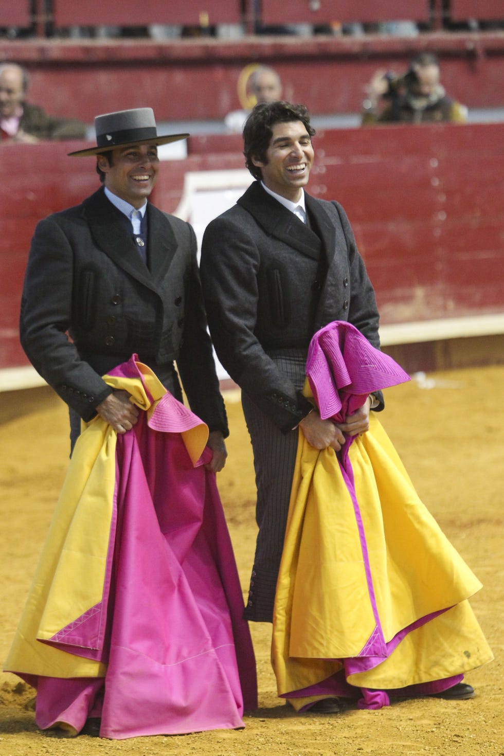 Matador, Bullfighting, Tradition, Sport venue, Pink, Animal sports, Magenta, Event, Outerwear, Performance, Matador, Bullfighting, Tradition, Sport venue, Pink, Animal sports, Magenta, Event, Outerwear, Performance,