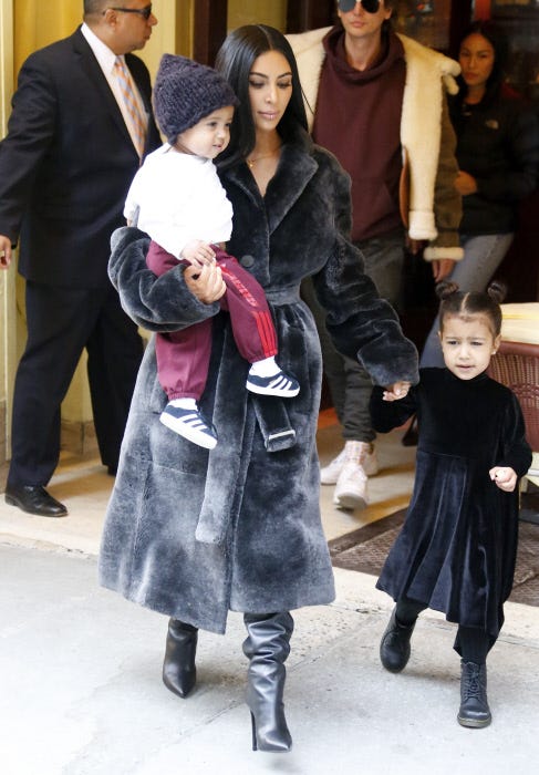 People, Fashion, Fur, Outerwear, Fur clothing, Event, Footwear, Child, Textile, Fashion design, 