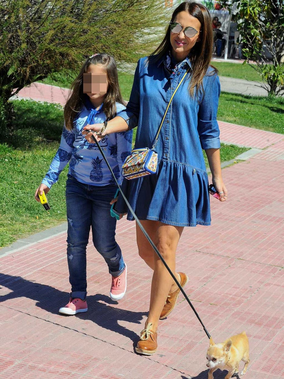 Clothing, Dog walking, Street fashion, Jeans, Fashion, Denim, Footwear, Leash, Electric blue, Textile, 