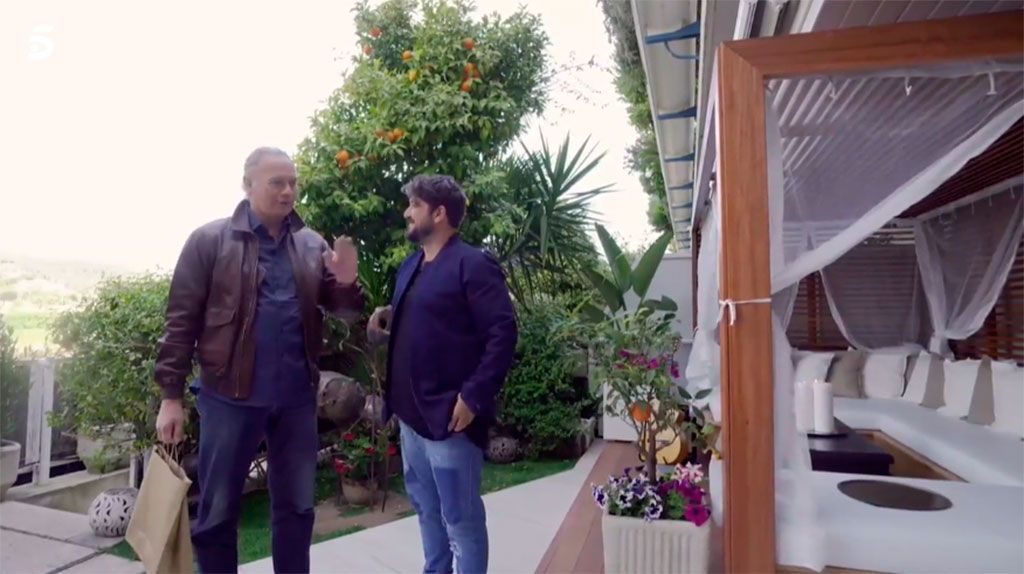 Plant, Trousers, Flowerpot, Jacket, Jeans, Denim, Houseplant, Garden, Resort, Outdoor structure, 