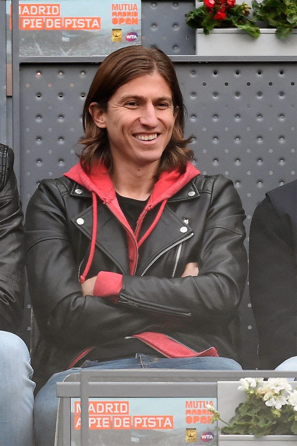 Jacket, Sitting, Leather, Leather jacket, Laugh, Houseplant, Top, 