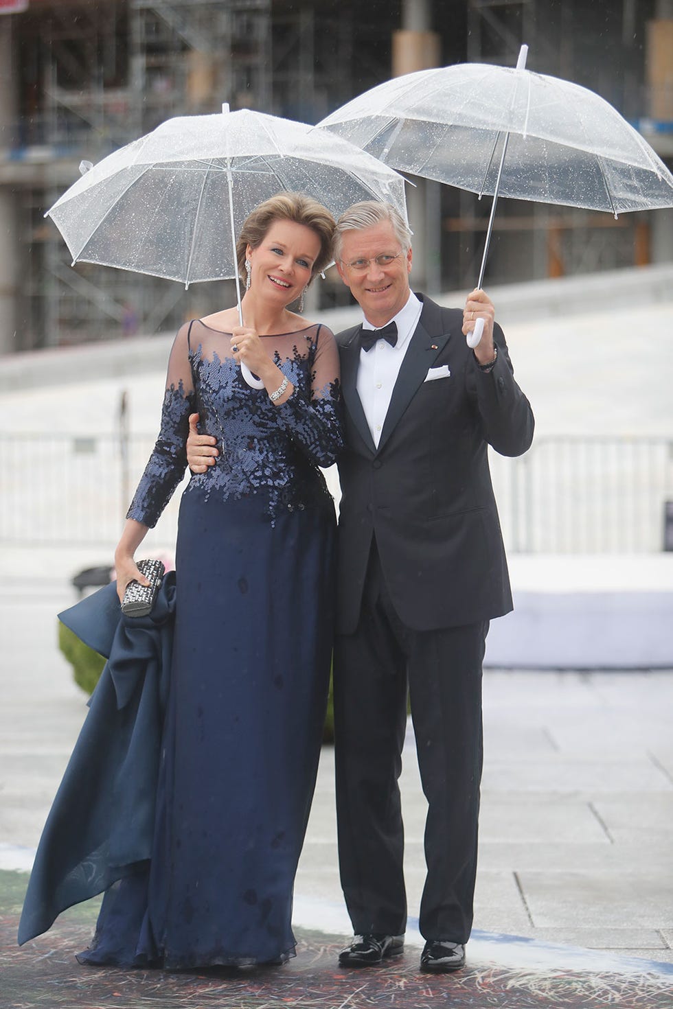 Umbrella, Fashion, Formal wear, Fashion accessory, Dress, Rain, Smile, Event, Suit, Veil, 