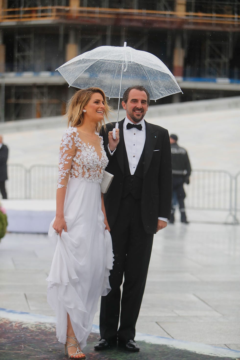 Clothing, Coat, Trousers, Human body, Umbrella, Shirt, Photograph, Dress, Suit, Outerwear, 